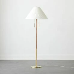 Pogo Brass and Cane Floor Lamp - Elegant Lighting for Modern Homes